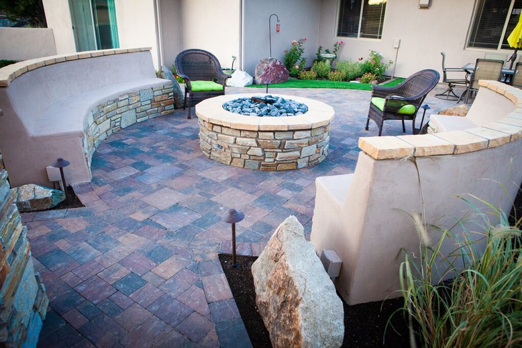 Fire Pit with Pavers, Stucco Walls picture. Back yard patio photo