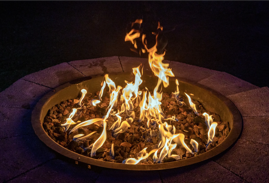 close up of a fire pit in the evening